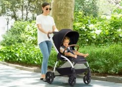 Delta Children Revolve Reversible Stroller -Kid Household Items 11898 001 Revolve Stroller Black Lifestyle 03