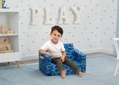 Delta Children Cozee Flip-Out Chair - 2-in-1 Convertible Chair To Lounger For Kids -Kid Household Items 208220 5061 Cozee Chair Blue Camo Lifestyle 02