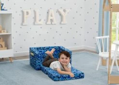 Delta Children Cozee Flip-Out Chair - 2-in-1 Convertible Chair To Lounger For Kids -Kid Household Items 208220 5061 Cozee Chair Blue Camo Lifestyle 13